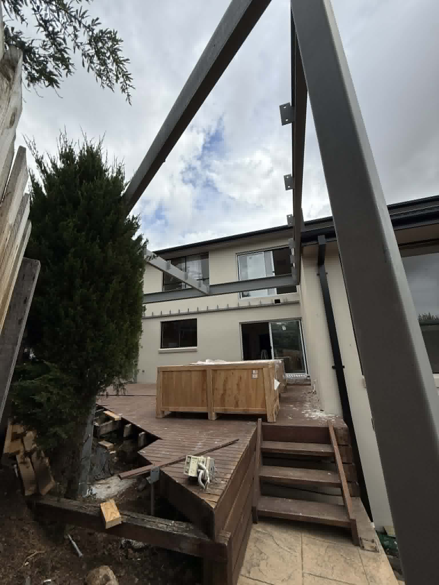 Steel beam and column beside a house at Avondale Heights