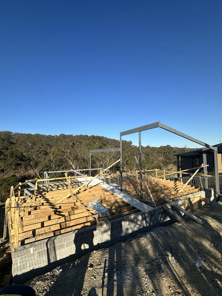 Steel roof frame above floor formwork at Diamond Creek