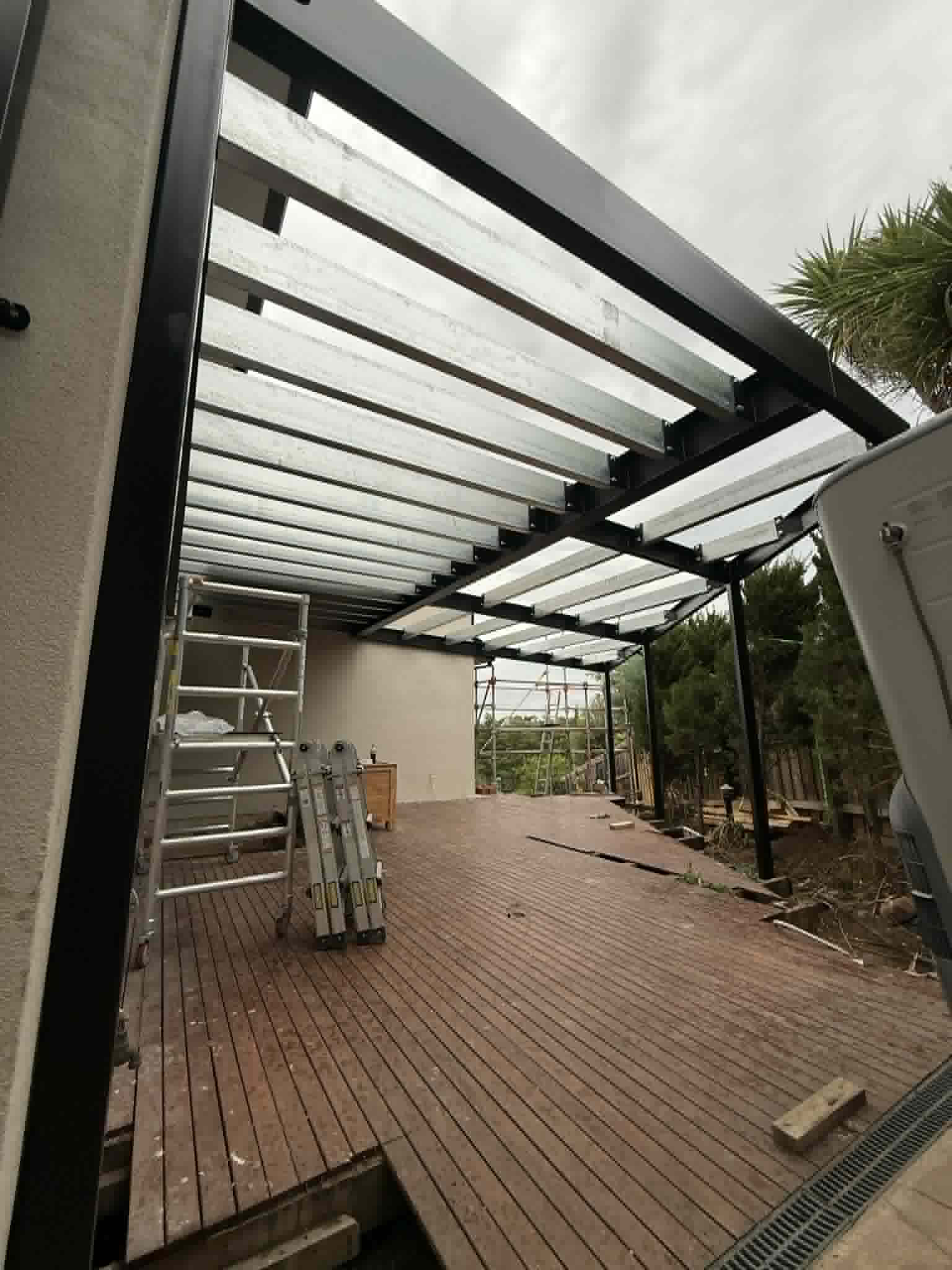 Overhead view of steel roof members above a deck at Avondale Heights