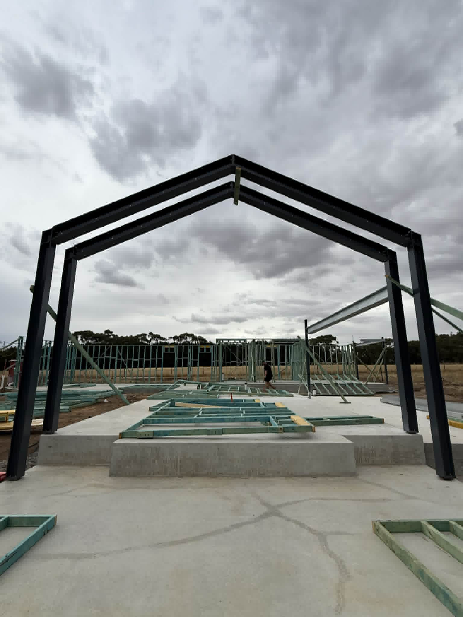 Front view of steel portal frames on a concrete slab at Waurn Ponds